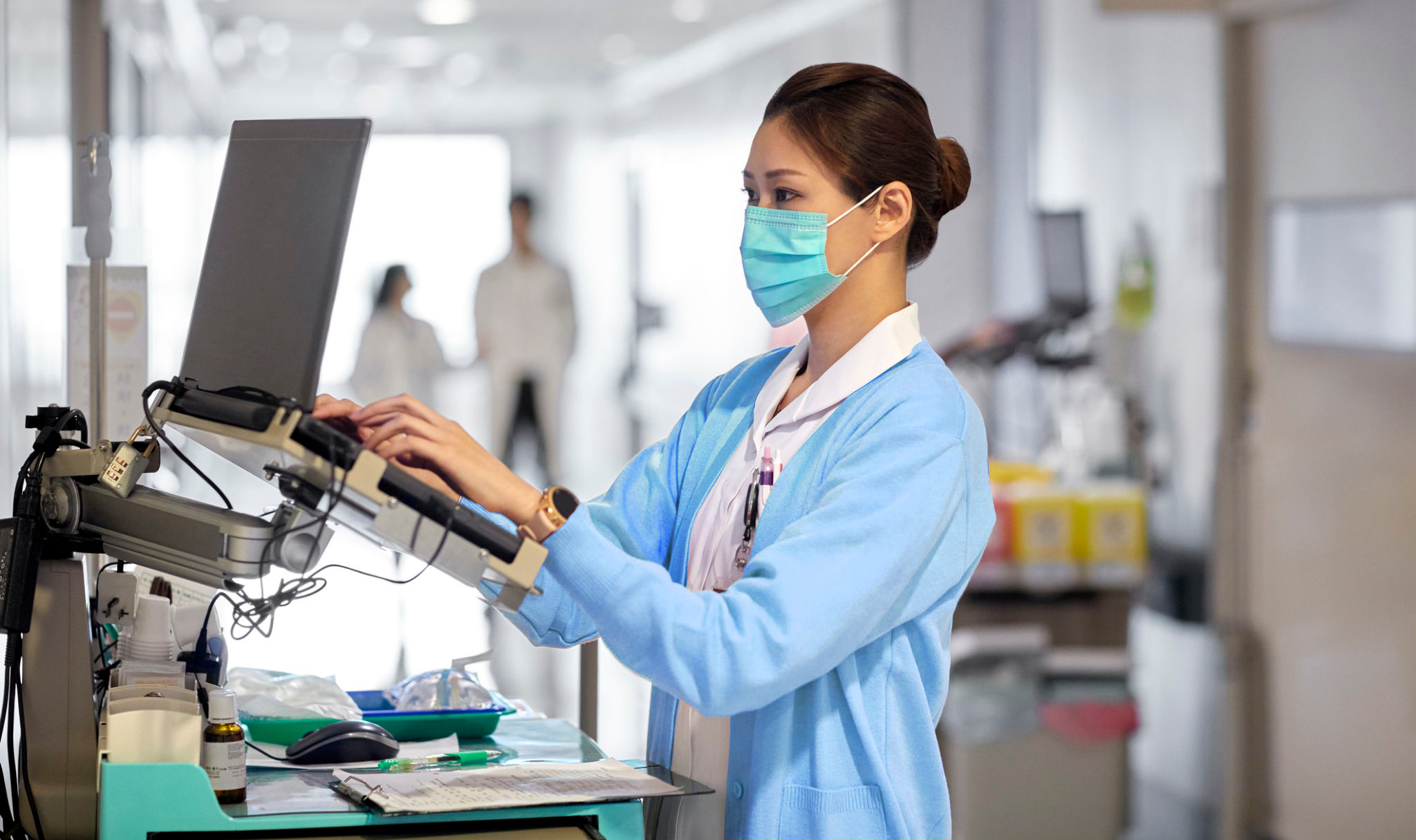 nurse at work station